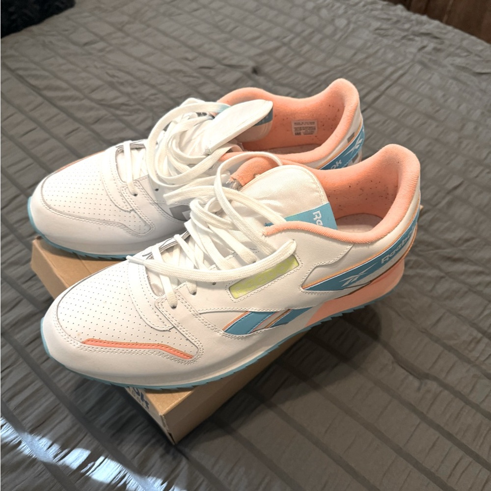 Reebok running shoe size 13 men’s. White,light blue & peach. Barley worn.